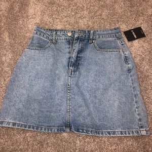 Jean skirt. Never worn, includes tags.